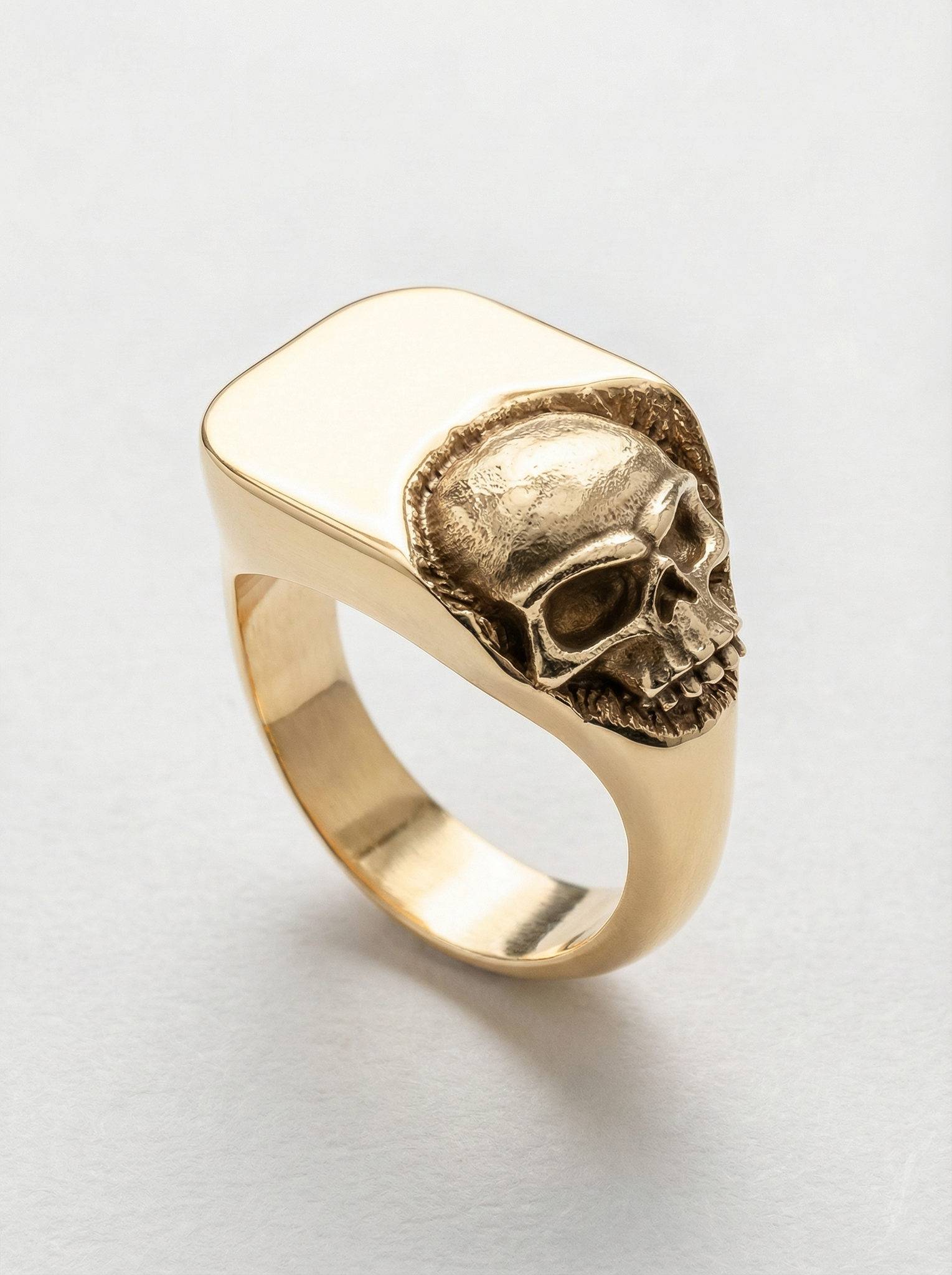 Sello calavera esculpida plata chapada oro para hombre Roberto Axpe