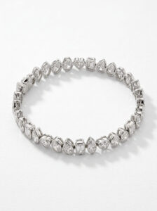 PULSERA RIVIERE DE ORO BLANCO CON DIAMANTES CON FORMAS
