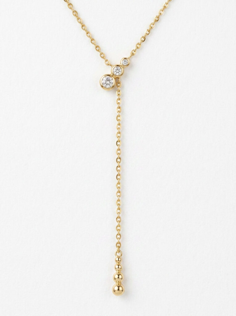 colgante corbata de oro amarillo con diamantes