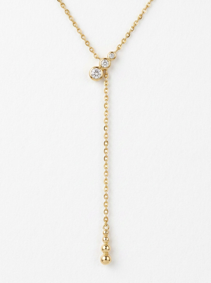 colgante corbata de oro amarillo con diamantes