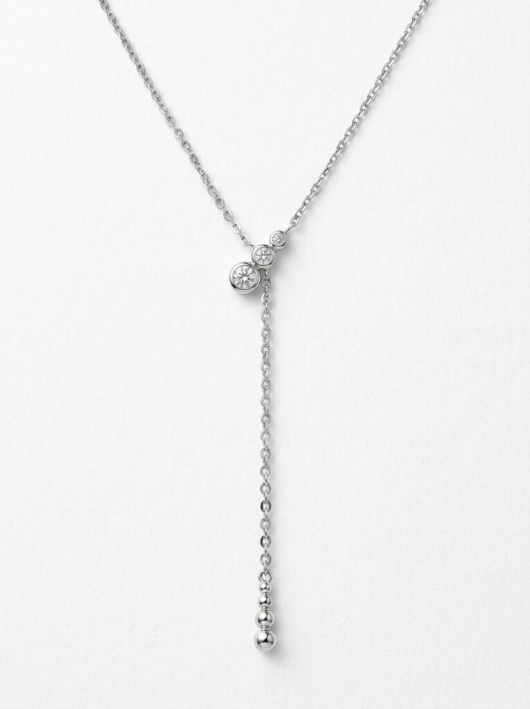 colgante corbata de oro blanco con diamantes- vista frontal