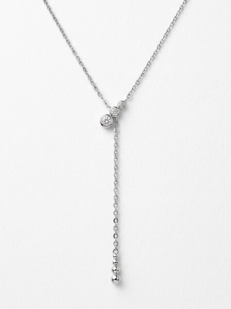 colgante corbata de oro blanco con diamantes- vista frontal